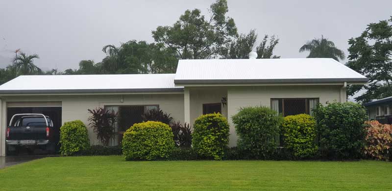 Reflect-coating-1 reflect roof coating on a white house